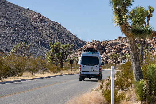 Joshua Tree National Park CA USA Feb 19, 2023 A Mercedes Sprinter Van drives through on a sunny day