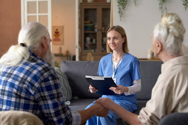 istock Nurse visiting senior couple at home 1484580145