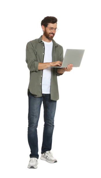 istock Handsome man holding laptop on white background 1484580567
