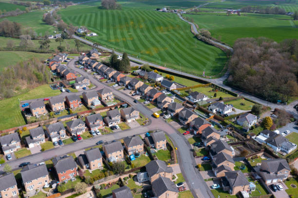 istock Drone view of modern homes in a Scottish town 1484581217