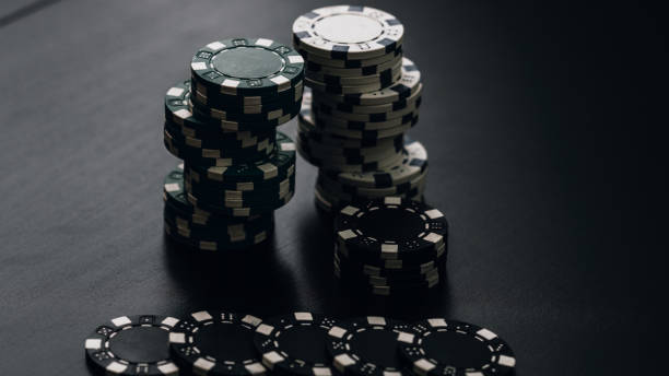 istock Stack of poker chips for high-stakes casino games 1484584138