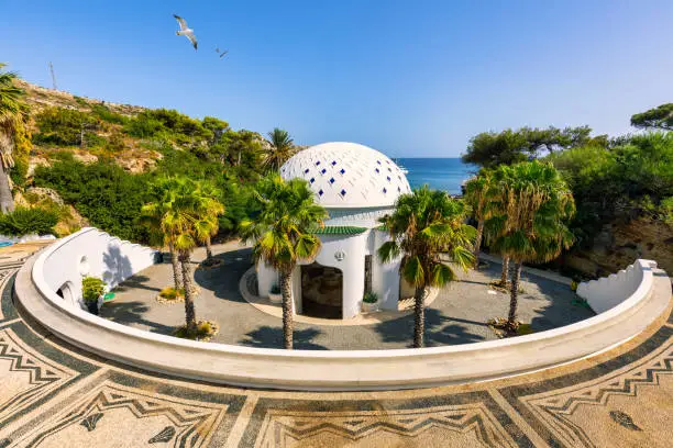 Photo of The beautiful buildings at Kalithea Springs constructed in the 1930s, Rhodes Island, Greece, Europe. Kallithea Therms, Kallithea Springs located at the bay of Kallithea on Rhodes island, Greece.