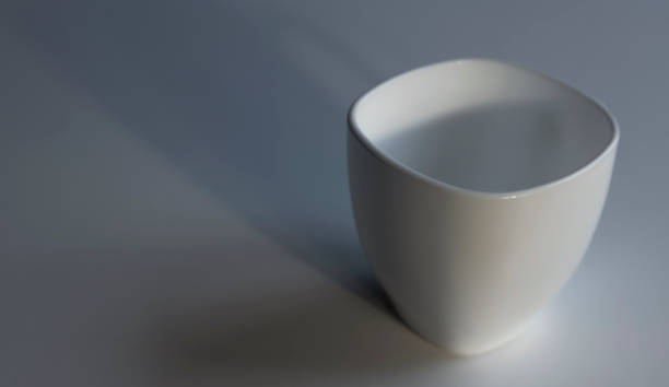 istock Ceramic dishes, an empty cup for morning coffee. On a gray background. 1484584350