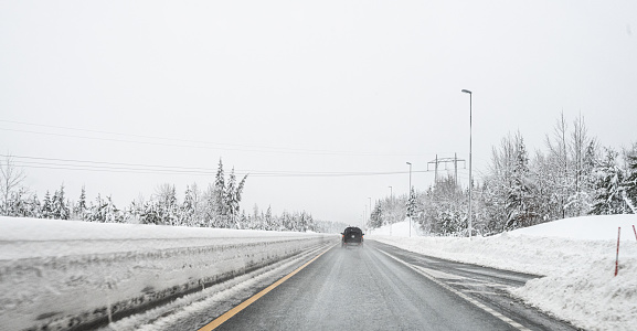 Gjerstad, Norway - January 07 2023: Driving on a highway after heavy snowfall.