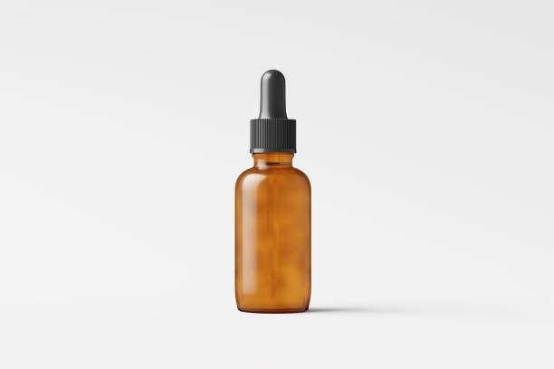 istock Amber Glass Dropper Bottle 3D Rendering White Blank Mockup 1484589928