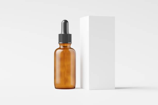 istock Amber Glass Dropper Bottle 3D Rendering White Blank Mockup 1484589959