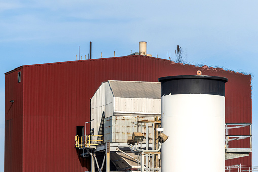 High quality stock photo of a woody biomass fuel burning power plant in Stockton, CA.