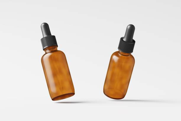 istock Amber Glass Dropper Bottle 3D Rendering White Blank Mockup 1484592881