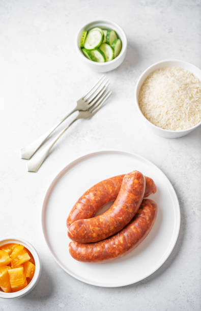 istock Raw uncooked sausages Chorizo in a plate 1484594265
