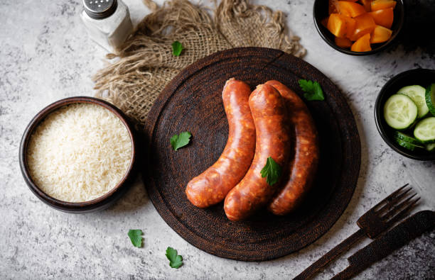 istock Raw uncooked sausages Chorizo in a plate 1484594276