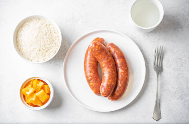 istock Raw uncooked sausages Chorizo in a plate 1484594284