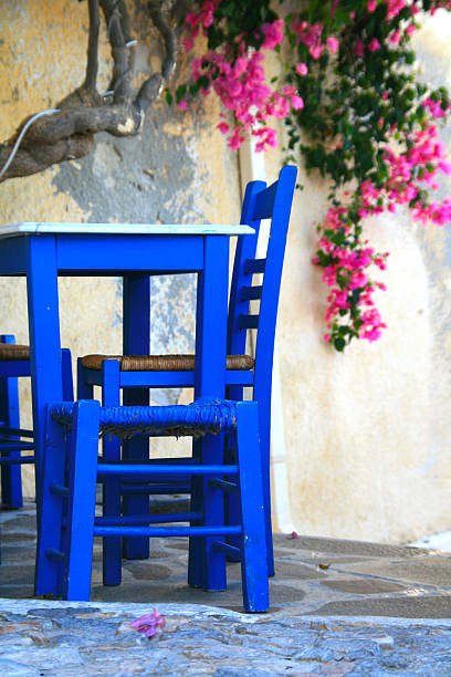 istock Greek taverna with blue chair and table 148459828