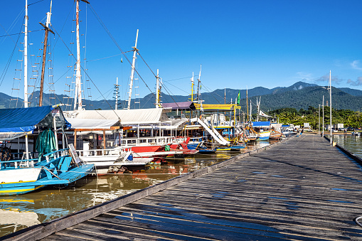 Beautiful Port of Paraty, Brazil with colorful tourist and fishing boats in the bay between Rio de Janeiro and Sao Paulo.