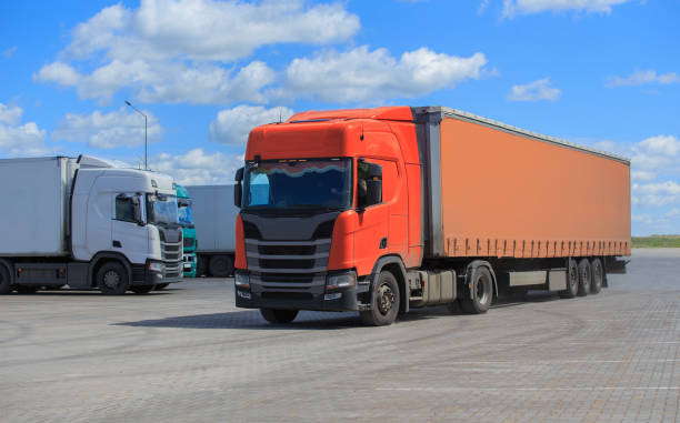 istock Trucks in a suburban parking lot 1484637492