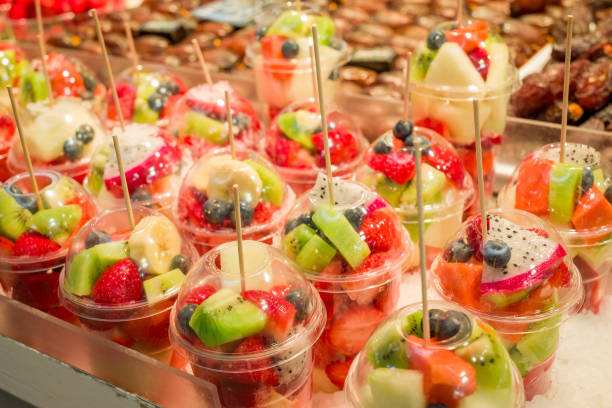 istock Fresh fruit juice Kiwi, Melons, Mango, Passion,  on ice at the market 1484651817
