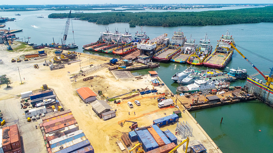 Riverside, Jetty with vessels drone view