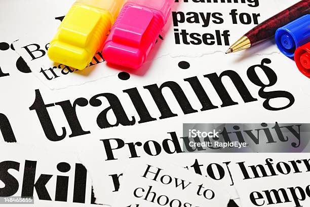 Highlighters Sit On Headlines About Training Stock Photo - Download Image Now - Alphabet, Blue, Business