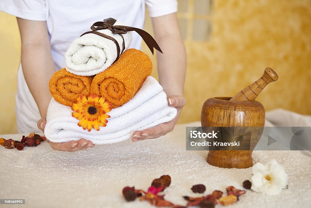 spa treatment nice foto with towels ans flowers for spa and hotels Flower Stock Photo