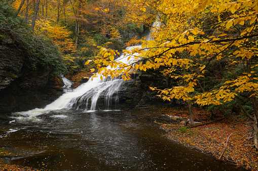 Dingmans Falls in the Poconos in Pennsylvania surrounded by fall color