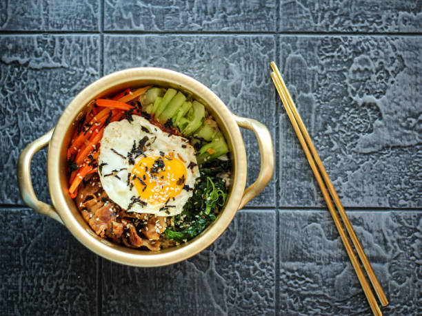 istock Bibimbap in a gold pan. 1484669597