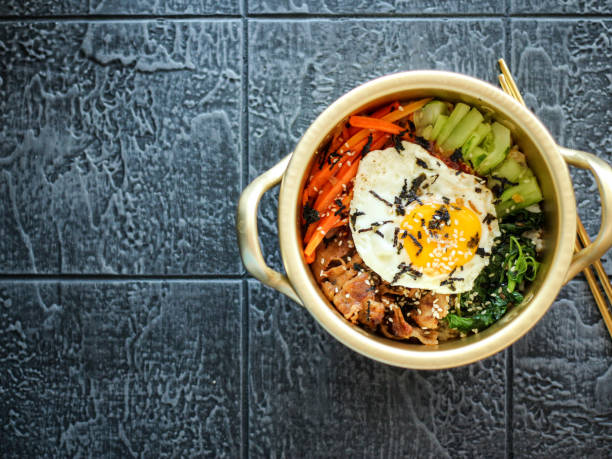 istock Bibimbap in a gold pan. 1484669617
