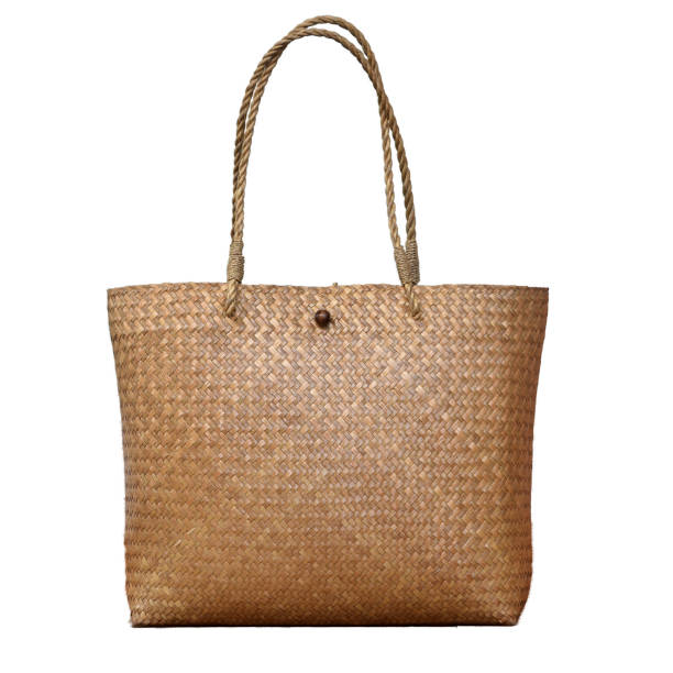 istock Brown handmade tote bag woven from natural materials isolated on white background 1484677743