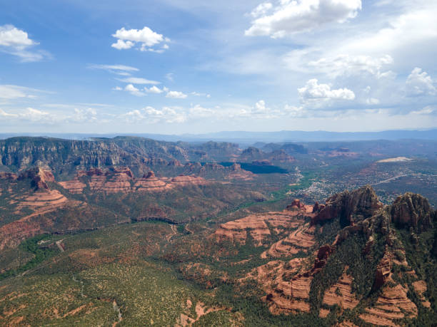 istock High View Point of Red Rock Formations and a Desert Valley on a Mixed Cloudy Day 1484678005