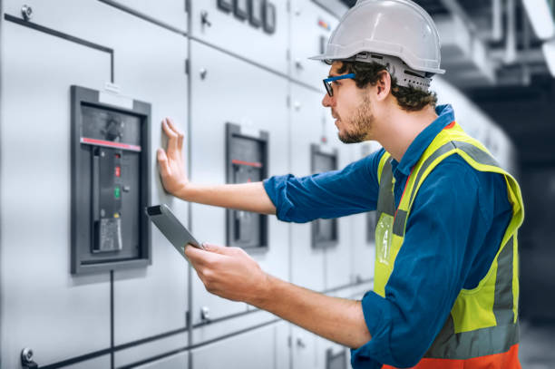An engineer maintains detailed records of all the inspections and their outcomes, including any issues identified, and the actions are taken to address them. stock photo
