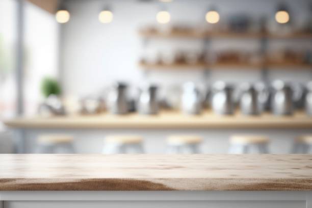 istock wooden table top with blurred kitchen background. Mock up 1484696426