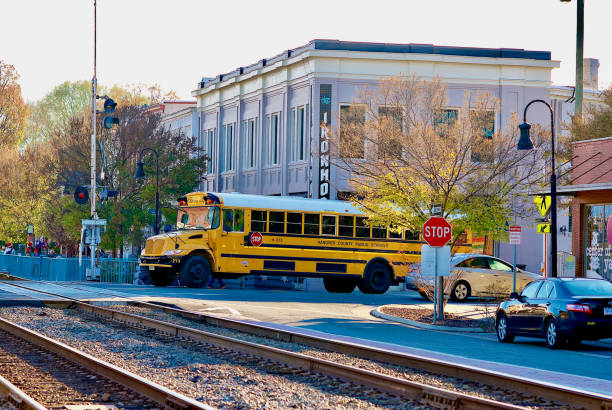 A bus with a school bus sign in its front part