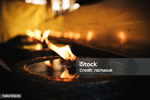 istock Flame in the Buddhist Temple 1484705025
