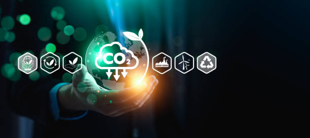 CO2 emission reduction concept, businessman with environmental technology Icons, global warming, sustainable development, renewable energy business. climate change, carbon capture, storage, reuse