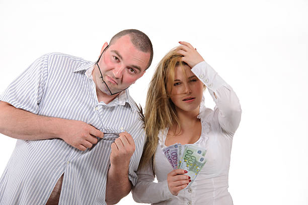 istock man and woman with money 148471955