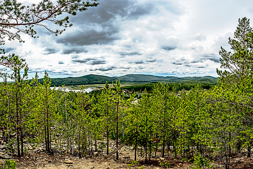 panoramic view of the mountainous terrain from a high point in the area of Mount Sugomak near the city of Kyshtym, Ural Mountains