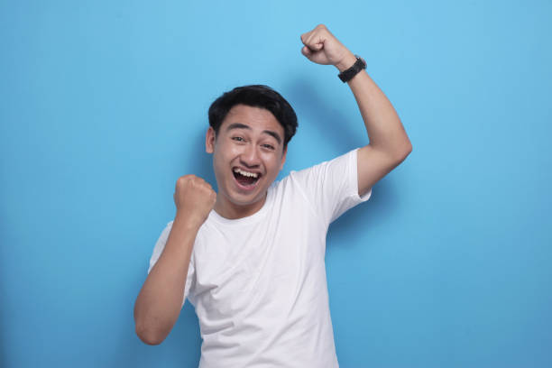 istock Happy Funny Asian Man Dancing Full of Joy 1484721917