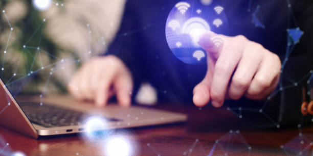 istock Businessman using laptop with glowing network hologram. Business communication social network concept. 1484721945