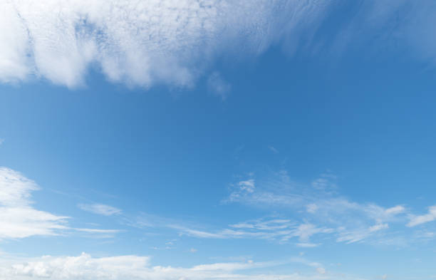 istock Panoramic view of clear blue sky and clouds, Blue sky background with tiny clouds. White fluffy clouds in the blue sky. 1484722264