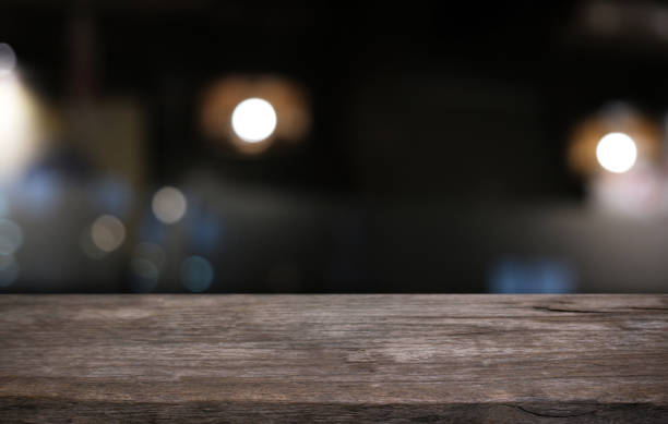 istock Wood Table Top in Blur Background room interior with empty copy space. 1484726718
