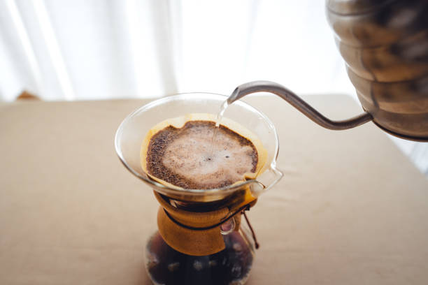 istock Pouring a hot water over a drip coffee 1484728001