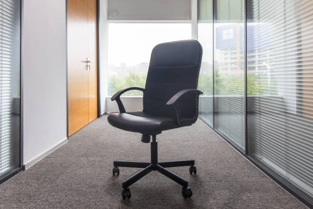 istock Chairs in the middle of the corridor in a modern office interior 1484729123