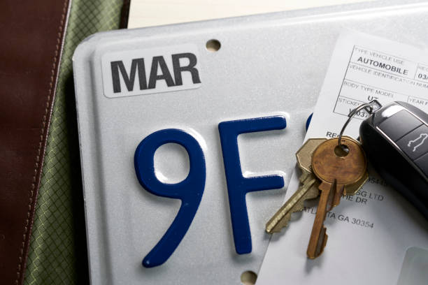 istock License plate registration for car with documents. DMV. USA 1484731770