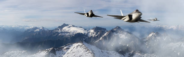 Military Fighter Jets flying over the mountain peaks.