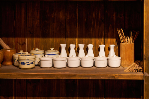 Sideboard and utensils in traditional Chinese restaurant