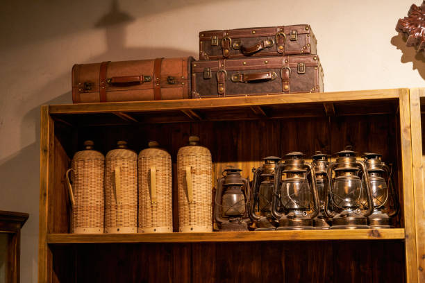 istock Retro old leather case and kettle and kerosene lamp 1484732979