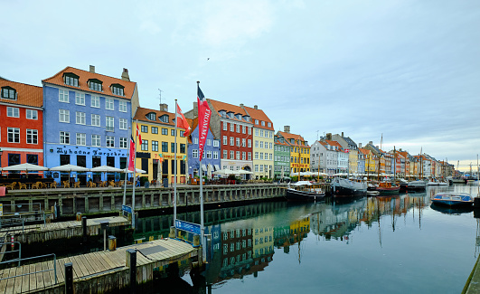 Multicolored houses along the canal in Nyhavn harbor, Copenhagen, Denmark