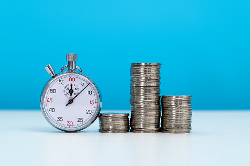 Coin stacks with a stopwatch