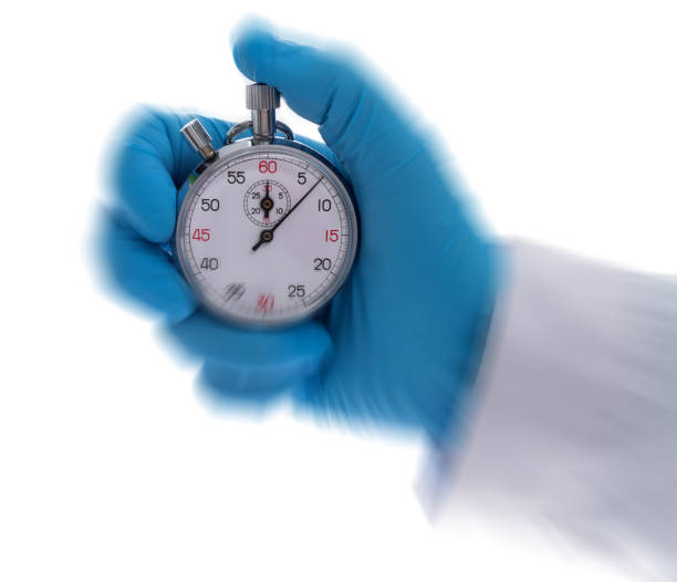 istock Doctor hand holding a stopwatch 1484737433