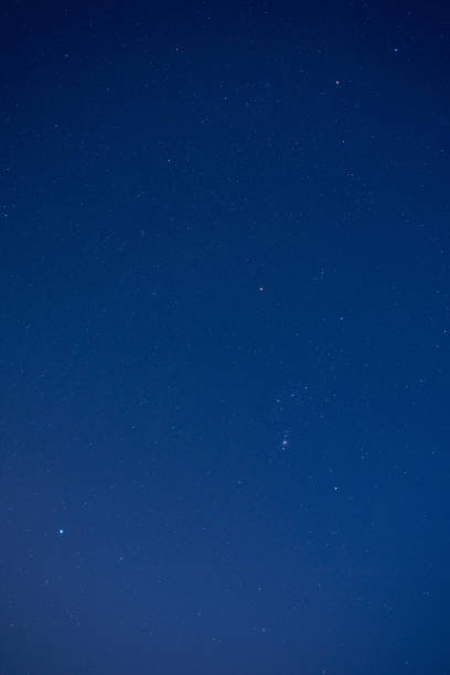 istock Orion constellation and various star clusters photographed with wide angle lens. 1484741064