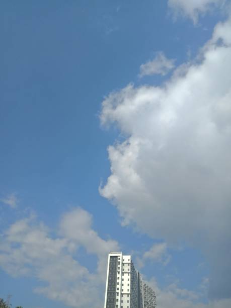 istock Apartement building and cloudy sky 1484741173