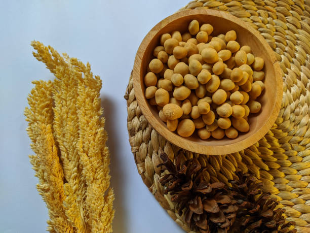 istock Indonesian snacks commonly called egg nuts are in a wooden bowl. top view 1484742500